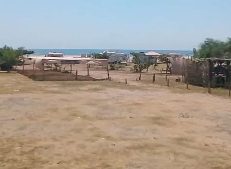 Villa plot directly on the sea for sale