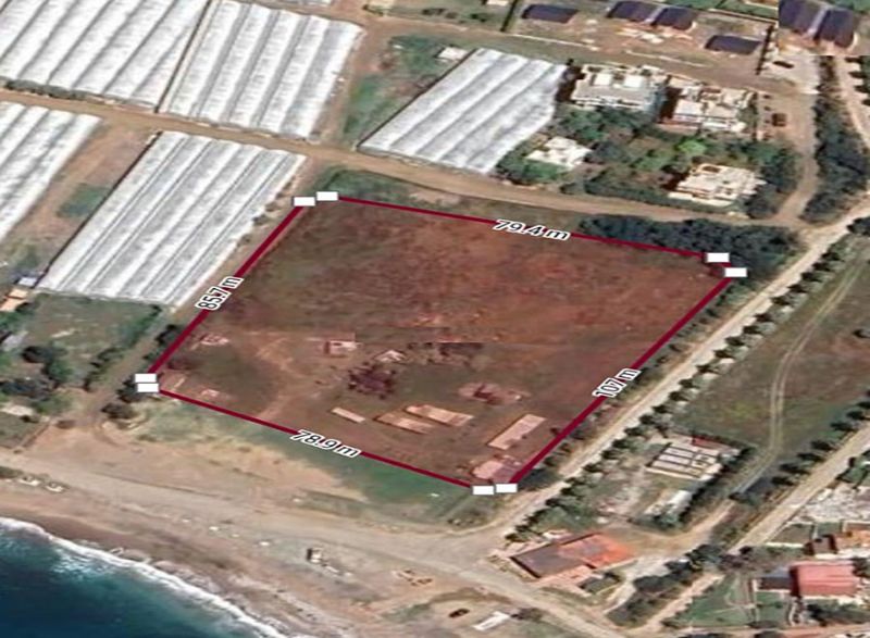 Villa plot directly on the sea for sale