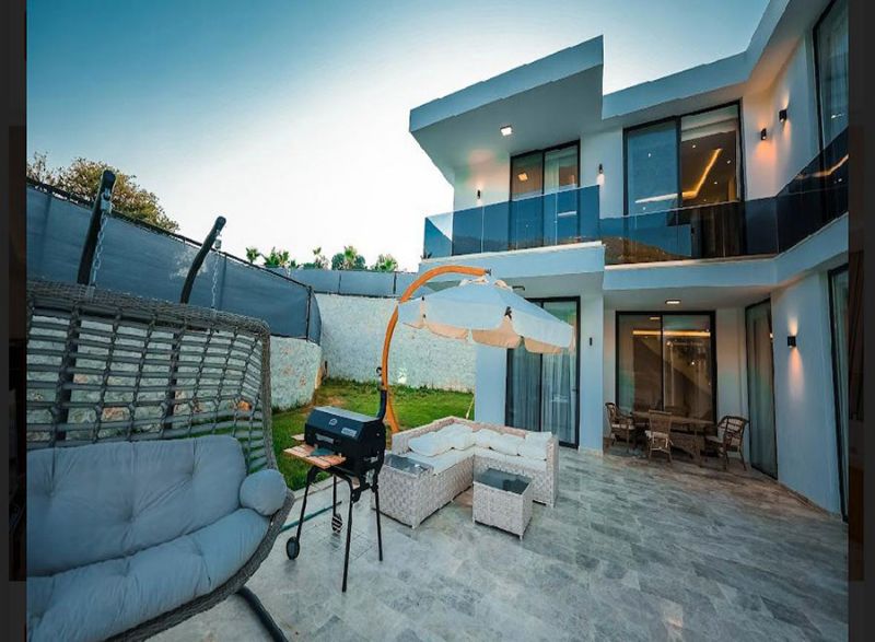 Four fully furnished detached villas for sale.