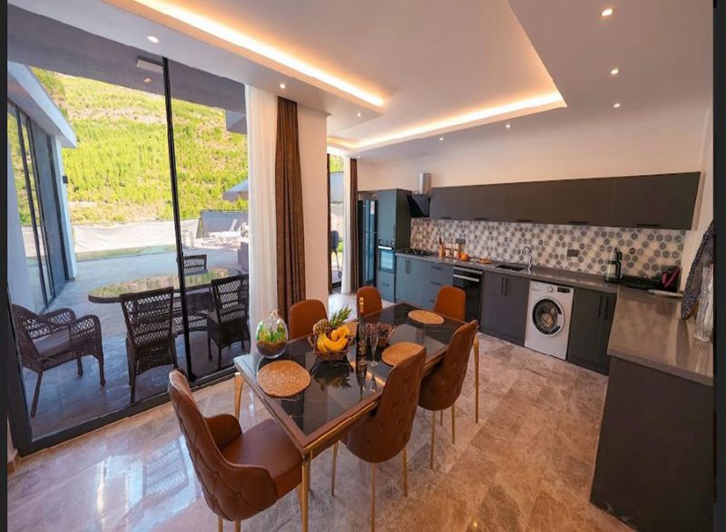 Four fully furnished detached villas for sale.