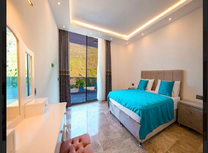 Four fully furnished detached villas for sale.