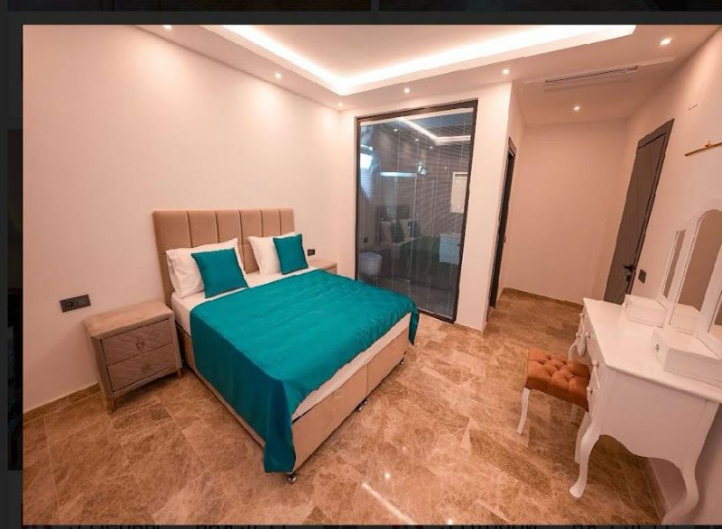 Four fully furnished detached villas for sale.