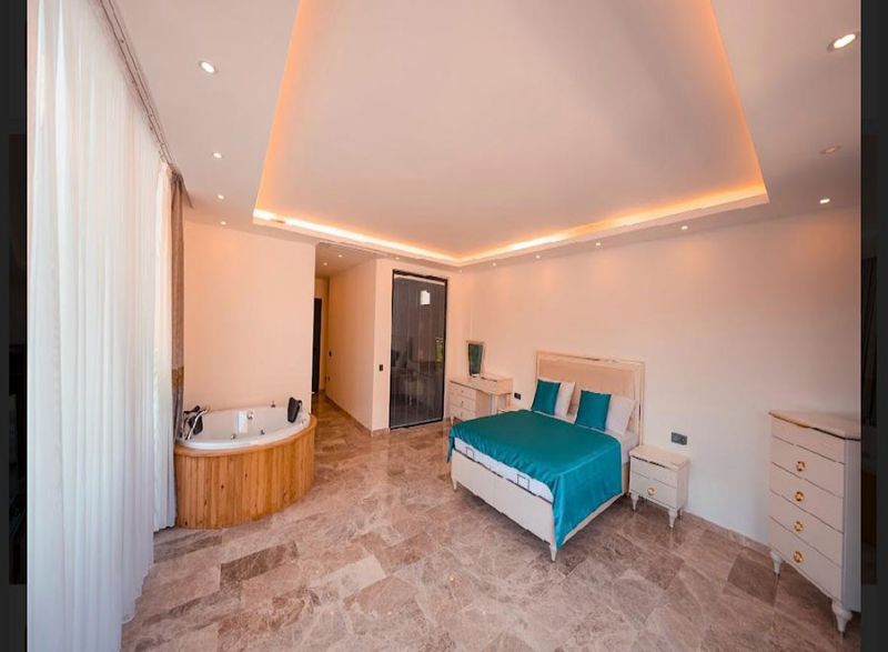 Four fully furnished detached villas for sale.