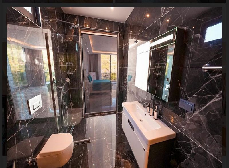 Four fully furnished detached villas for sale.